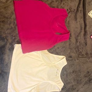 Two tank tops and one sports bra from NVGTN